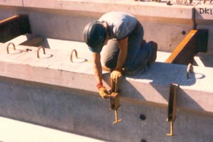 Worker installing a BORG hanger