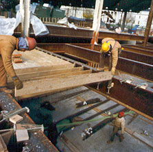 Workers installing joists